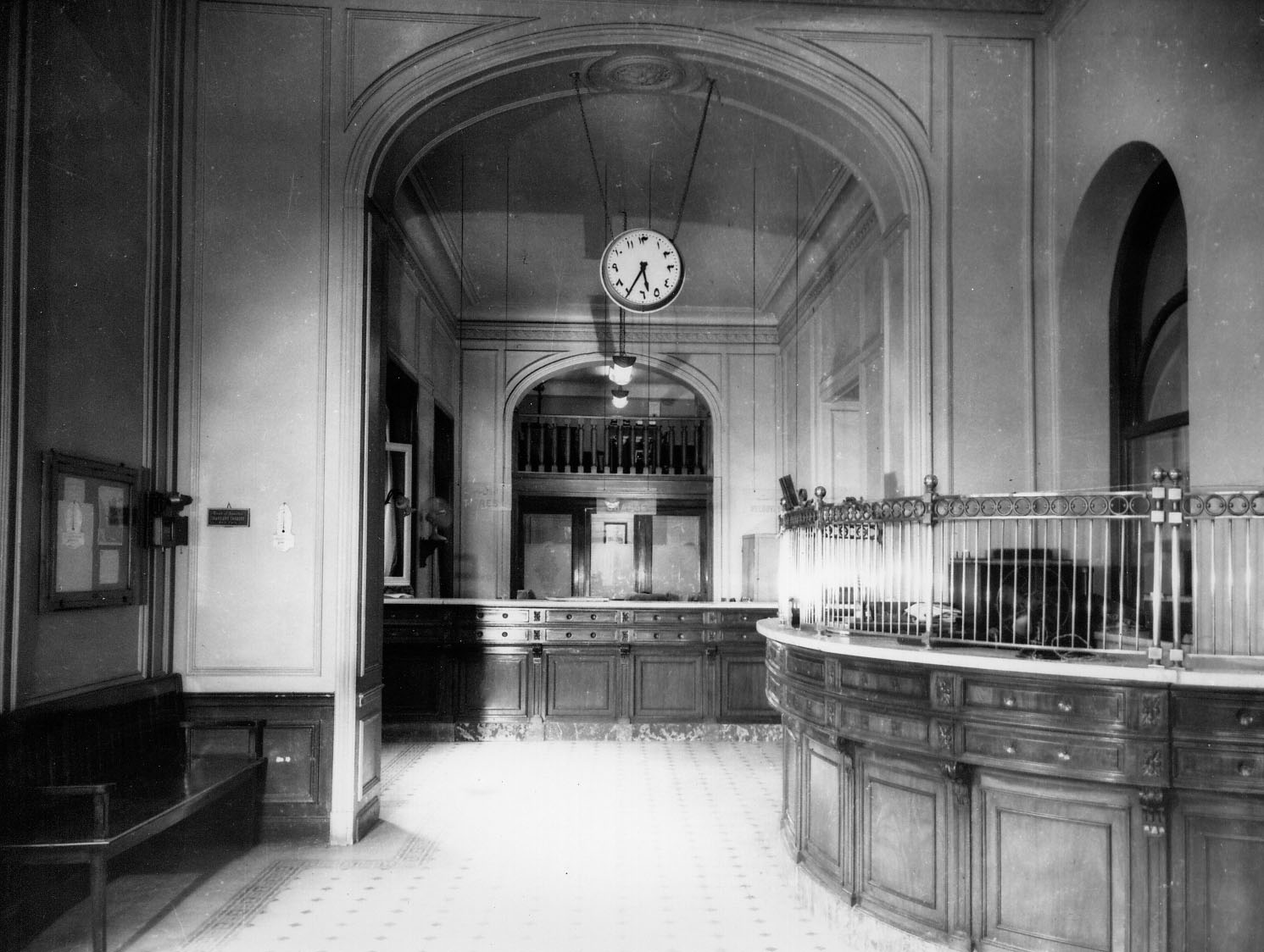 Interior of the Commercial Bank of the Near East main branch, London, with transaction counter.  Interior of Commercial Bank main branch, London