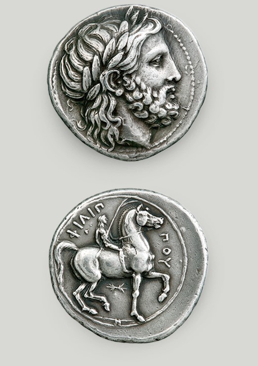 Two sides of the silver tetradrachm of Philip II. On the obverse the head of Zeus, on the reverse Philip riding his horse.