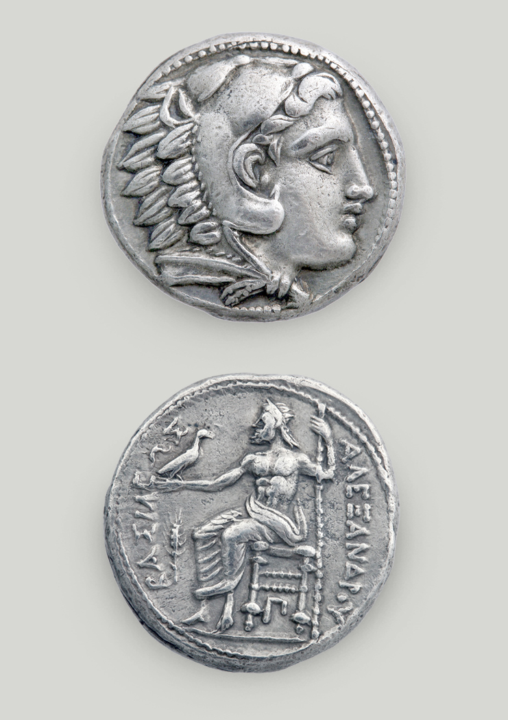 Two sides of tetradrachm of Alexander the Great. On the obverse head of Heracles in profile, on the reverse Zeus with eagle and sceptre.