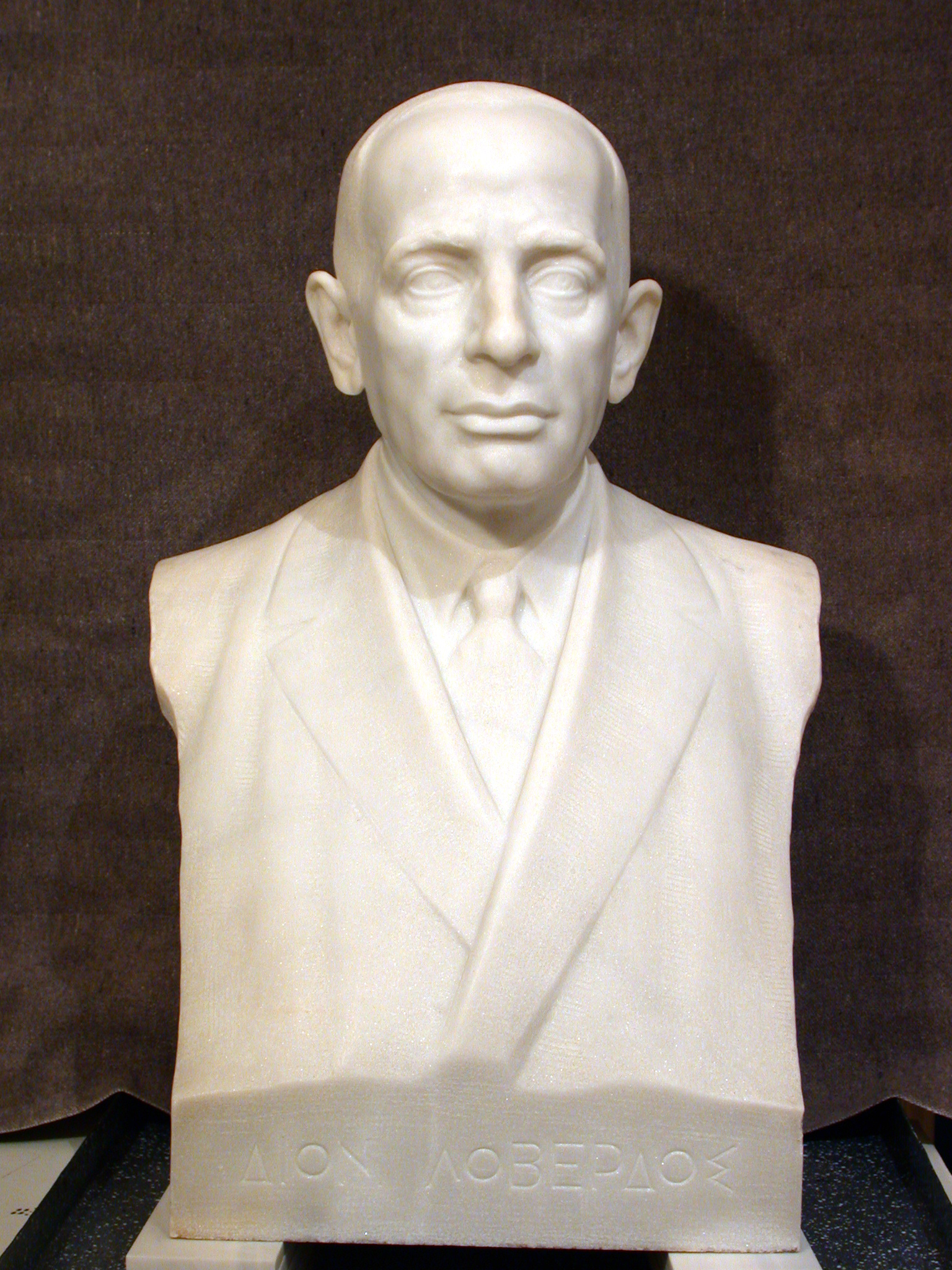 White marble bust, full-face, with the inscription Dion. Loverdos. Bust of Dionysios Loverdos