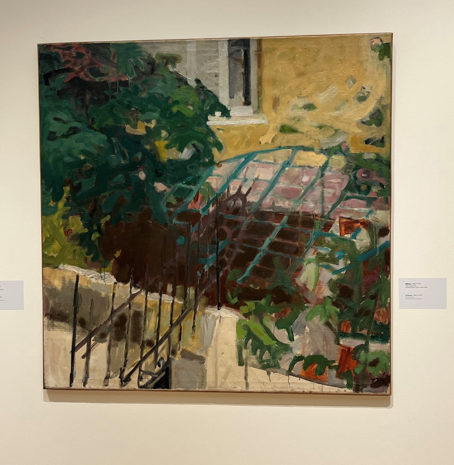 The work “Athens” on a beige wall. Highlight from the exhibition