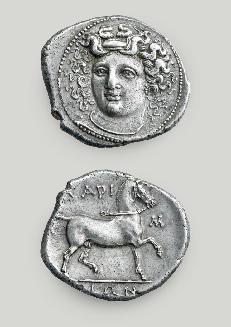 Two sides of Larissa silver didrachm. On the obverse head of nymph Larissa, on the reverse horse and the legend “of the Larisseans”.