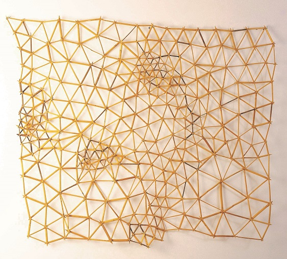 A beige-coloured mesh, made of reed canes tied together with string.